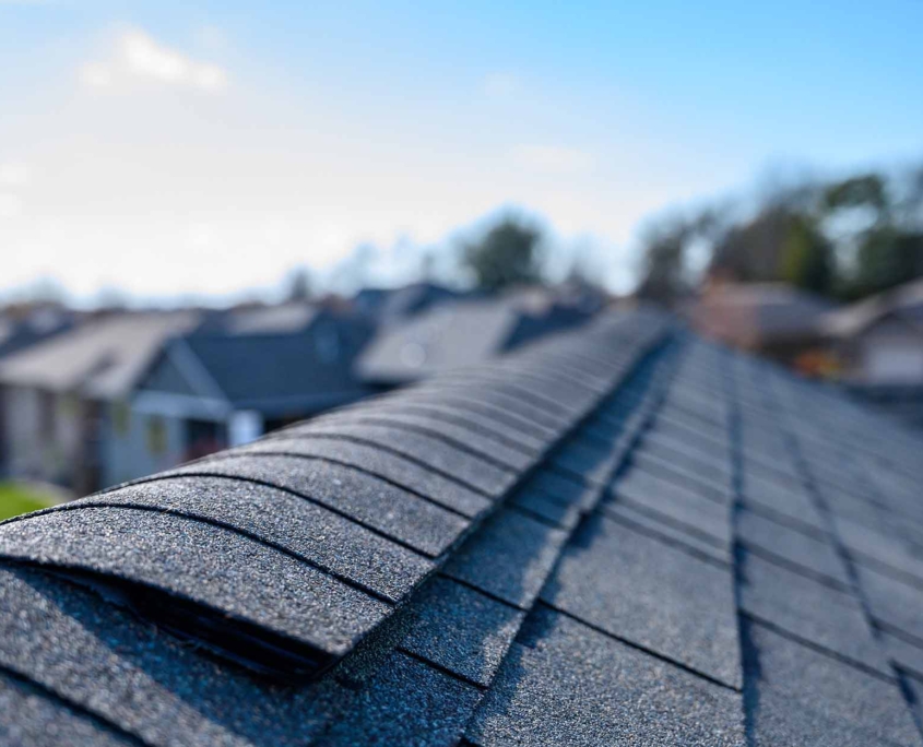 View down the top of an Asphalt shingle roof with ridge cap